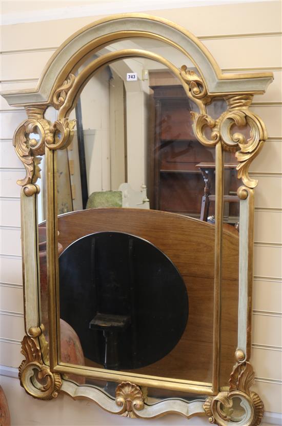 A gilt / eau de nil arched mirror, H.125cm